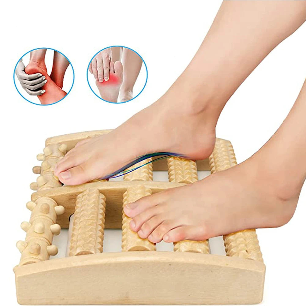 Person using a wooden foot massager with insets showing sore feet and knee.